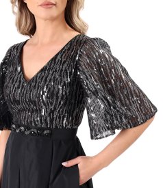 Long cocktail dress with voluminous sleeves and a sequin bodice