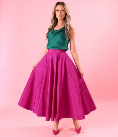 Evening outfit with bias-cut blouse and long flared skirt