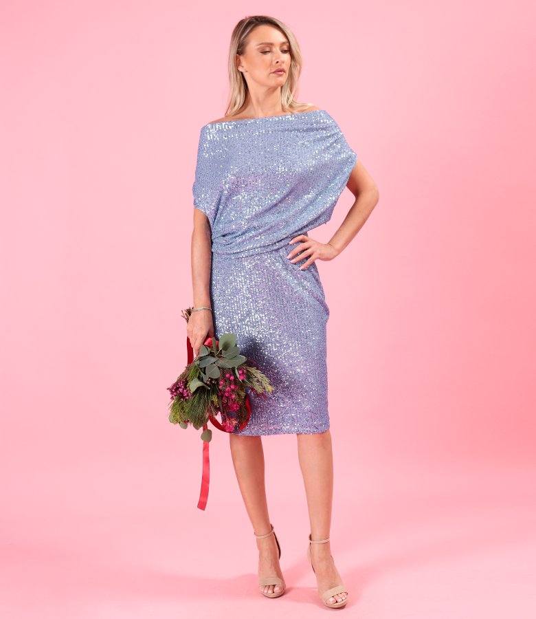 Evening sequin dress featuring a refined neckline with dramatic asymmetric draping