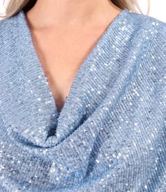 Evening sequin dress featuring a refined neckline with dramatic asymmetric draping