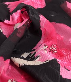 Evening dress in printed chiffon with floral motifs