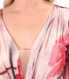 Evening dress in printed chiffon with floral motifs