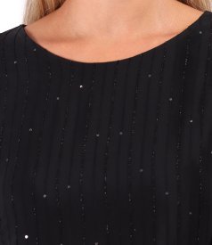 Evening dress in viscose with metallic yarn and sequins