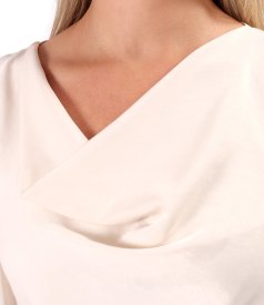 Elegant blouse with draped neckline and long sleeves