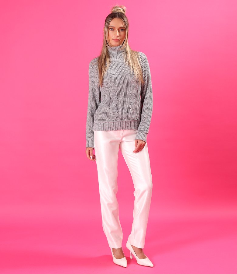 Knitted sweater with textured yarn and high neck